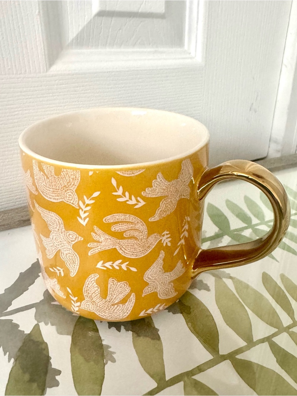 Sunshine Yellow Ceramic Mug with White Bird Motif and Gold Handle